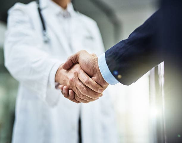 Olios Health physicians partnering in a collaborative meeting
